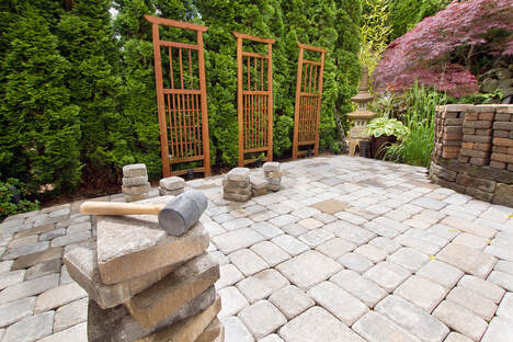 stone masonry patio being built