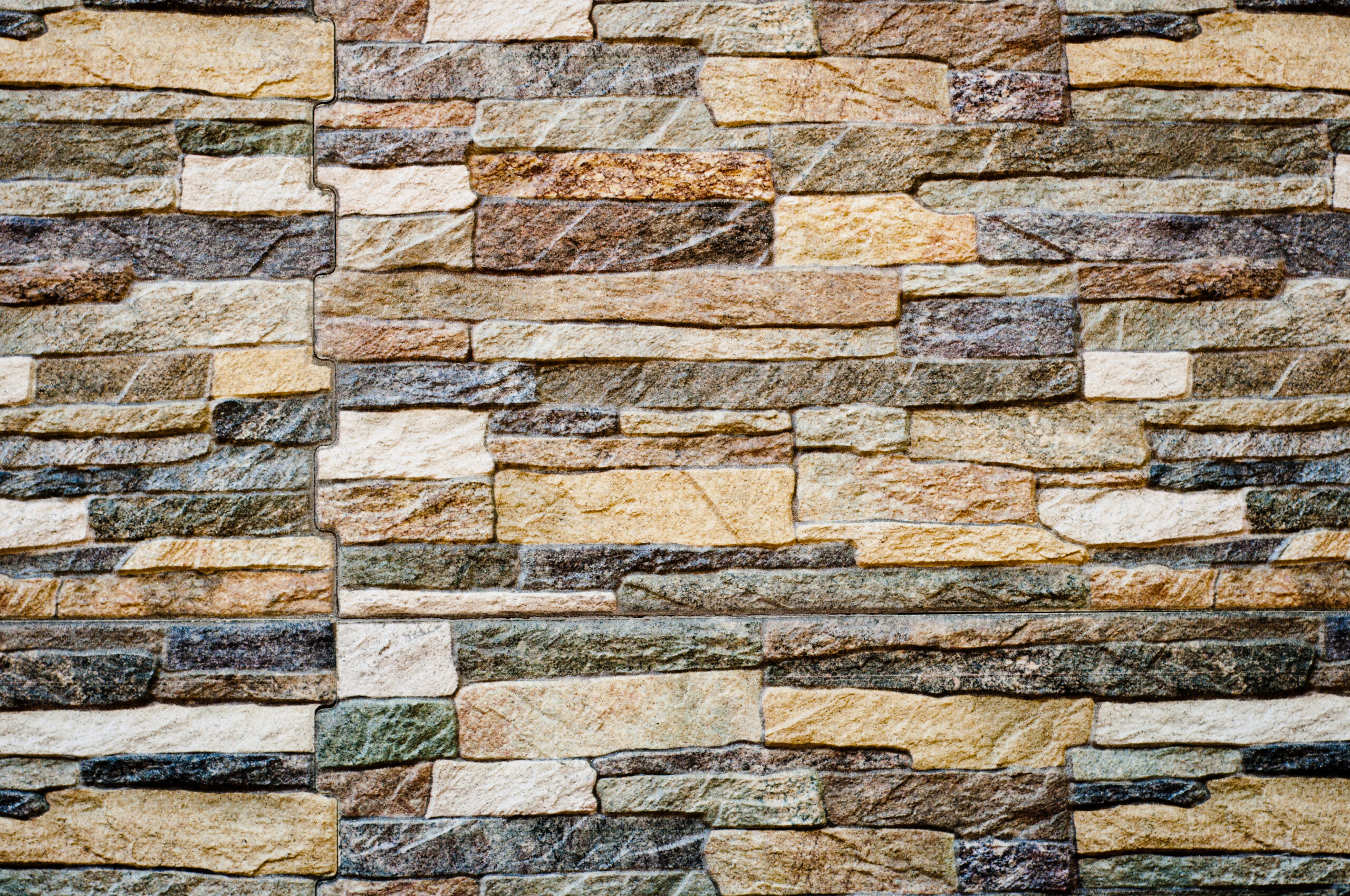 background picture of modern flat rock multicolored stone wall