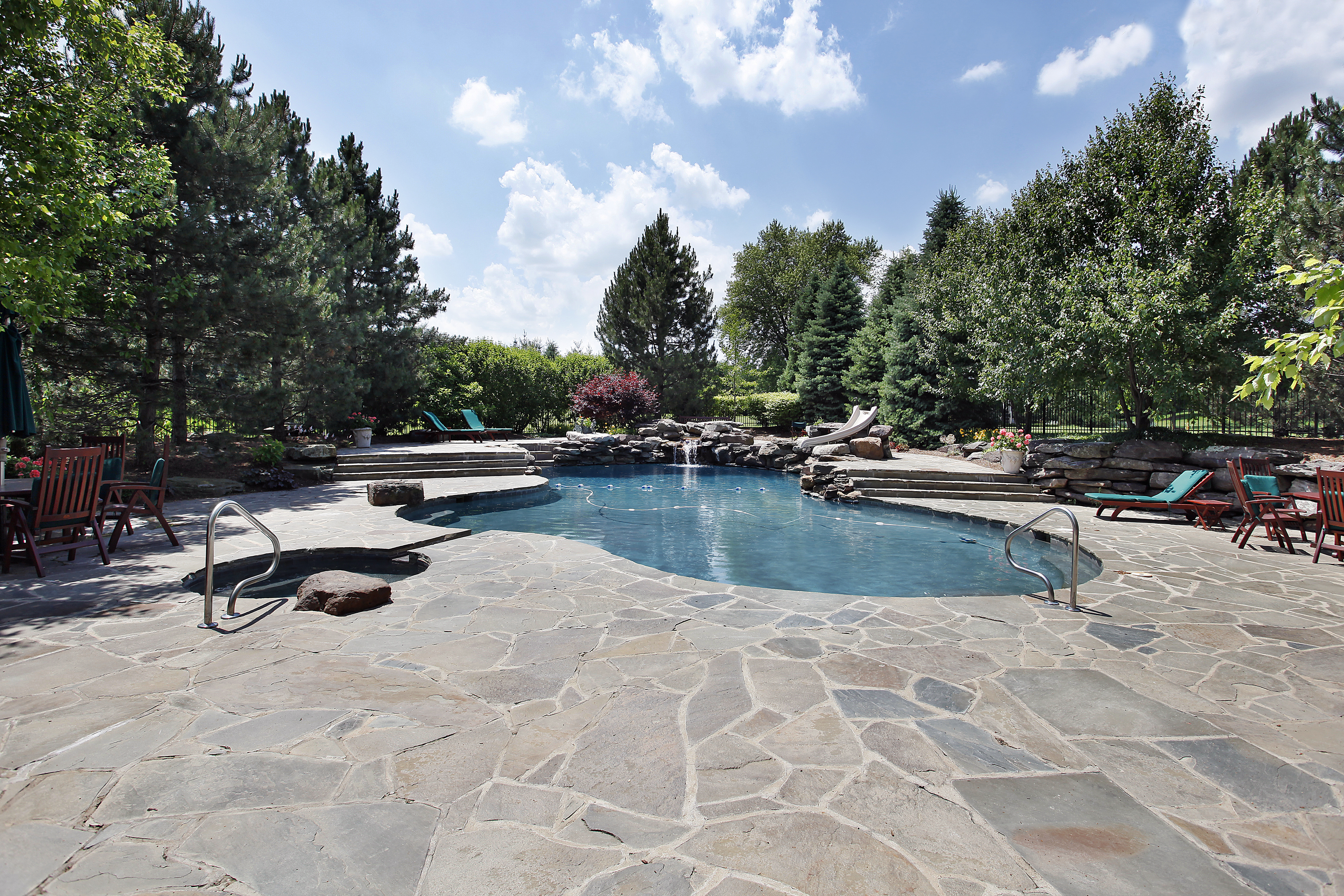 Stone masonry pool patio