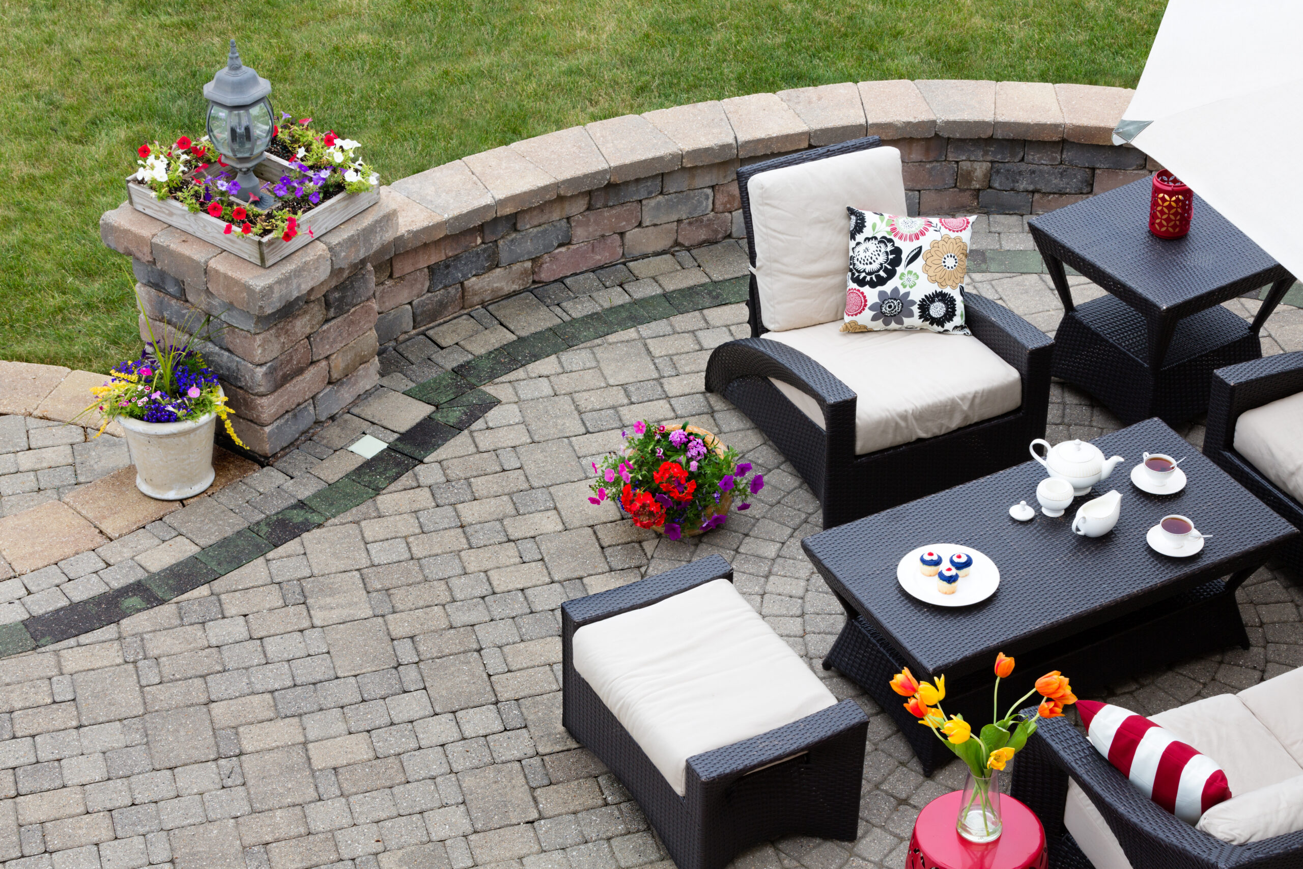 Brick paved patio with patio furniture